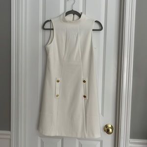 Beautiful lined white sheath dress.